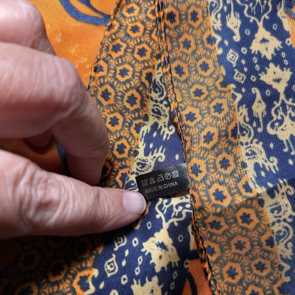 boho chic floral satin square scarf features a vibrant orange base, silky, purse